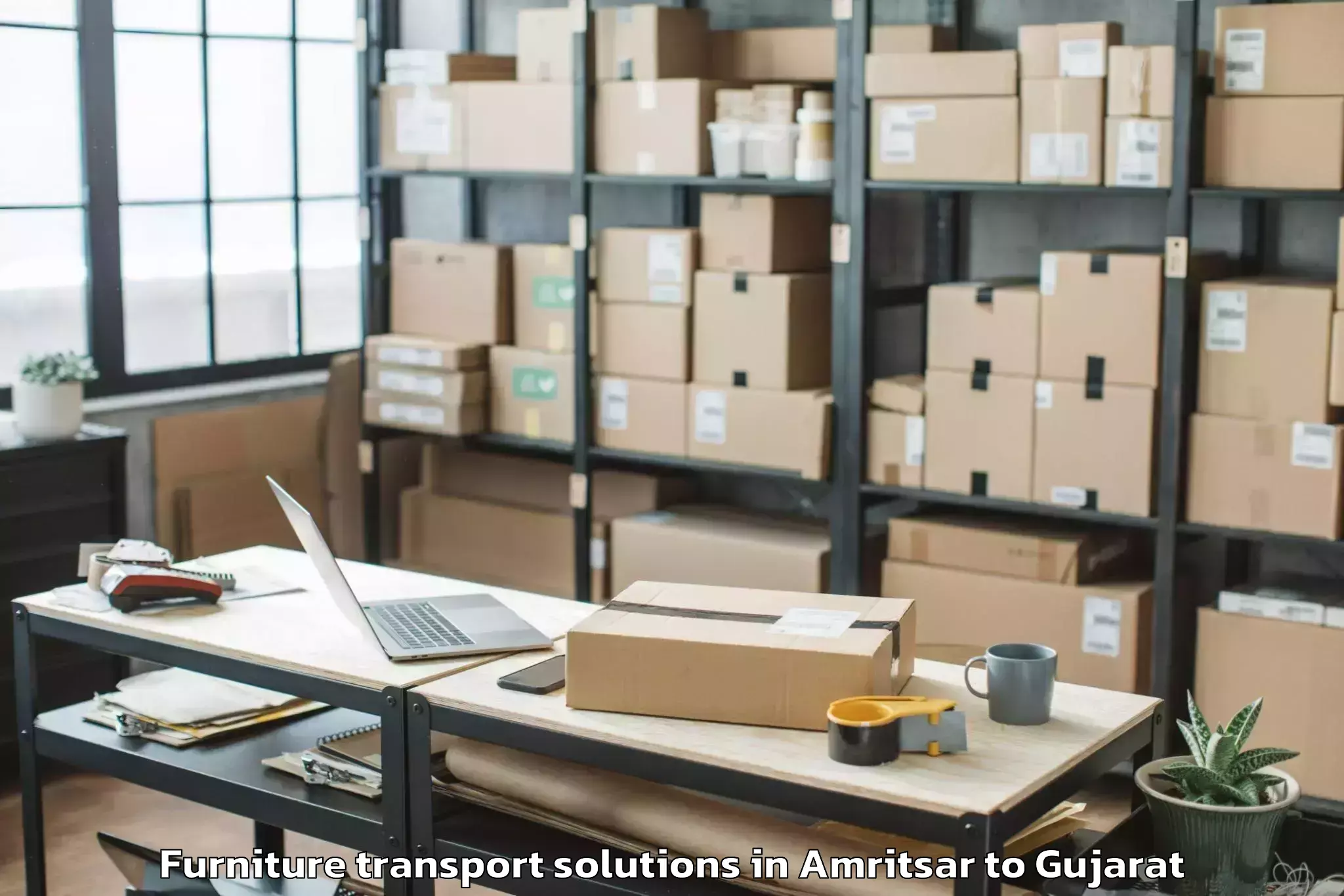 Expert Amritsar to Balasinor Furniture Transport Solutions